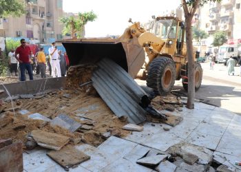 جانب من إزالة المخالفات فى أكتوبر