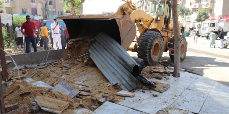 جانب من إزالة المخالفات فى أكتوبر